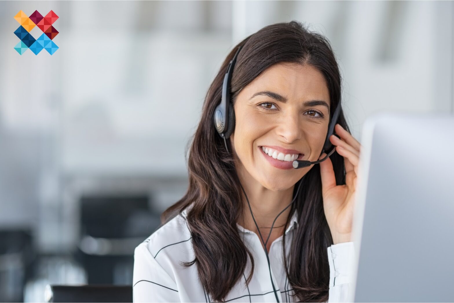 A person answering a telephone call.